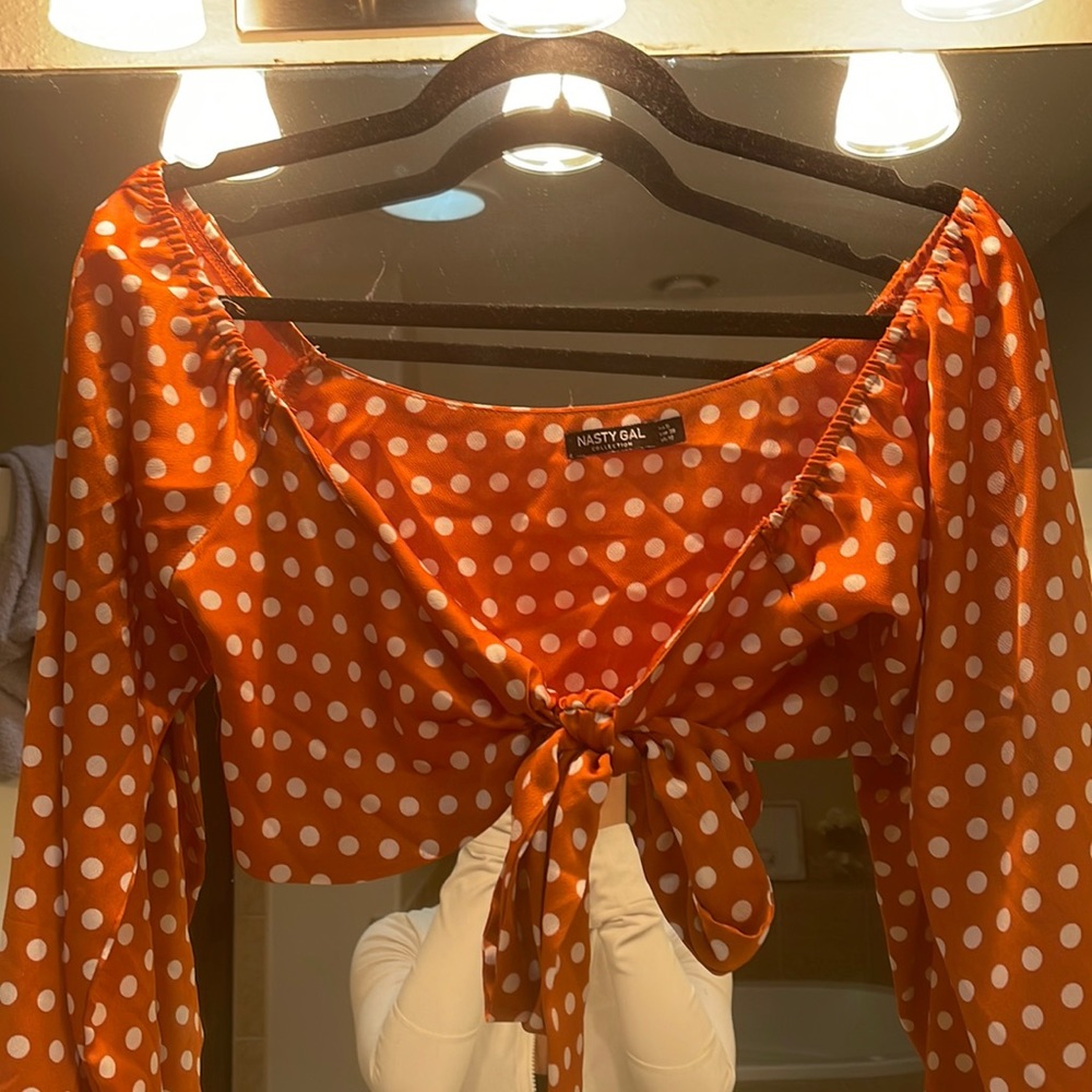 Orange (burnt) polka dot tie in front long sleeve crop top